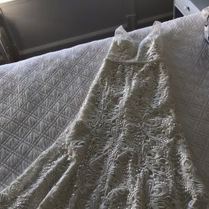 Beautiful white lace gown. Never worn!
